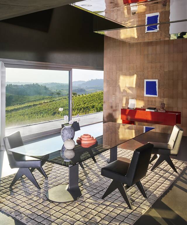 Designer dining area. Immerse yourself in Cassina elegance